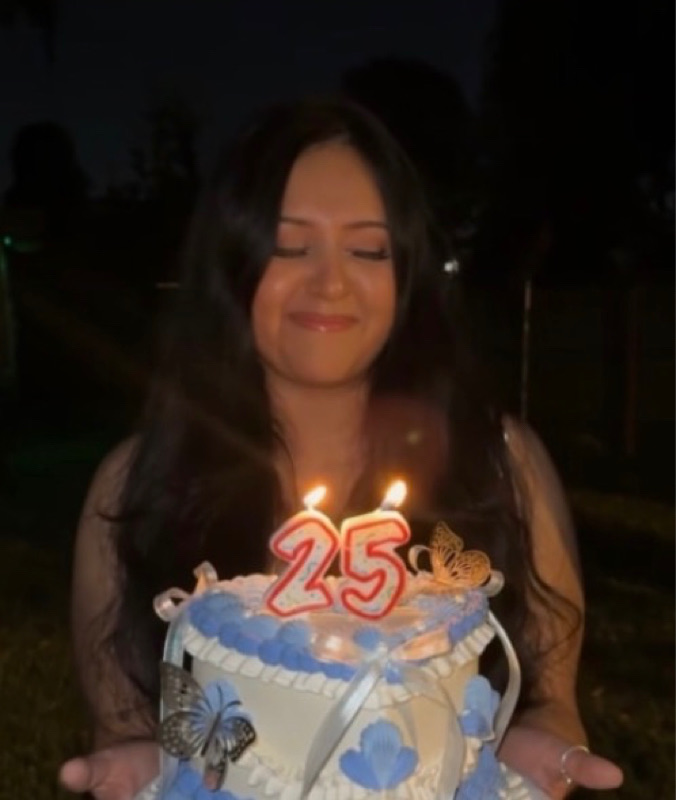 Jade holding a birthday cake